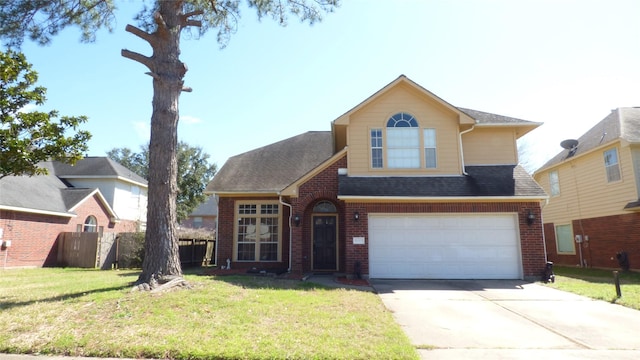 traditional-style house with a garage, a front lawn, concrete driveway, and brick siding