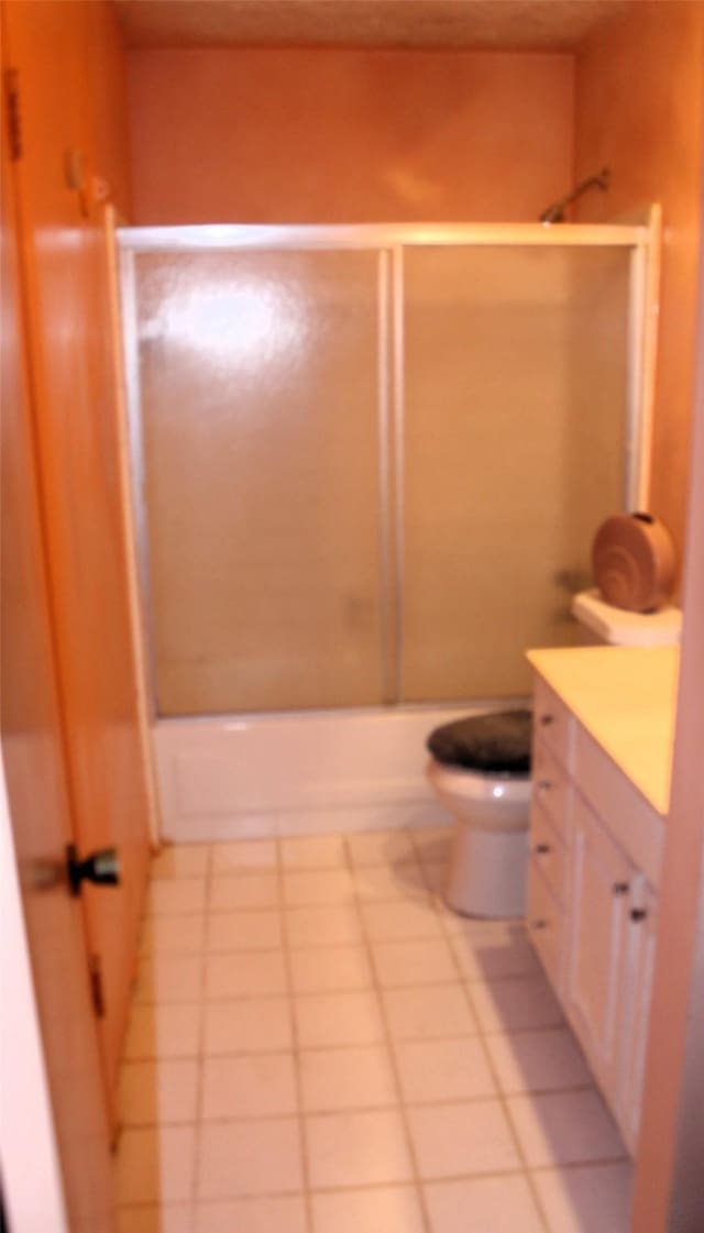 full bathroom with bathtub / shower combination, toilet, and vanity