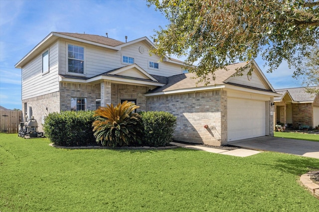 view of front of property with a garage and a front lawn