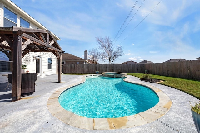 view of swimming pool with a patio and an in ground hot tub