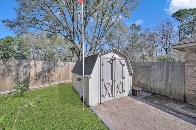 view of outbuilding with a lawn