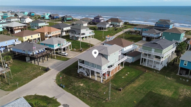 birds eye view of property featuring a residential view and a water view