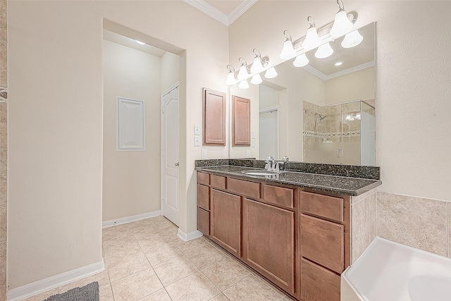 bathroom featuring tile patterned floors, ornamental molding, vanity, and a shower with shower door