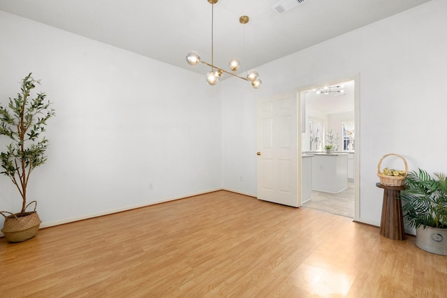 unfurnished room featuring light wood-type flooring