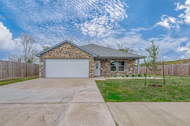 ranch-style house with a front yard and a garage