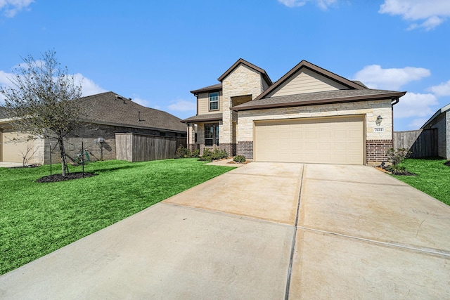 view of front of house featuring brick siding, a front yard, fence, a garage, and driveway