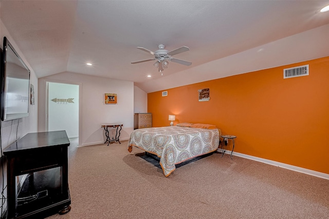 bedroom featuring ceiling fan, carpet flooring, and lofted ceiling