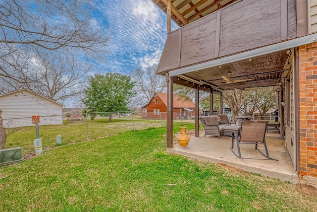 view of yard featuring an outdoor hangout area, a patio, and a fenced backyard