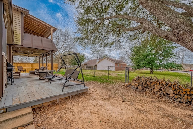 view of yard featuring a fenced backyard and a wooden deck