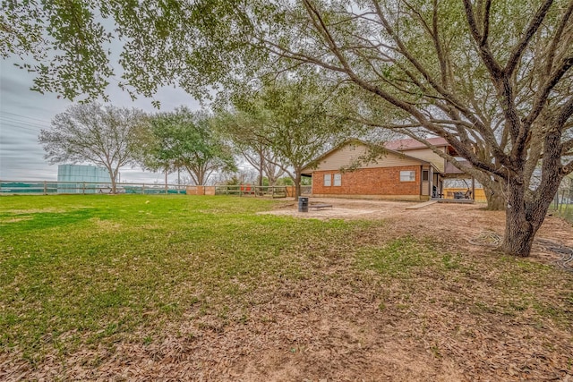 view of yard featuring a patio area and fence