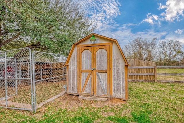 view of shed with a fenced backyard