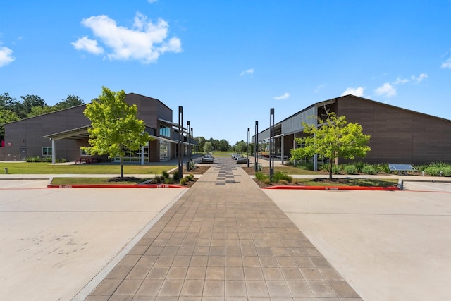 view of street featuring curbs and sidewalks