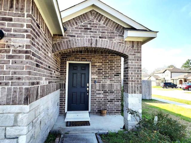 24827 Colony Meadow Trl, Houston, TX 77336 - doorway to property featuring brick siding