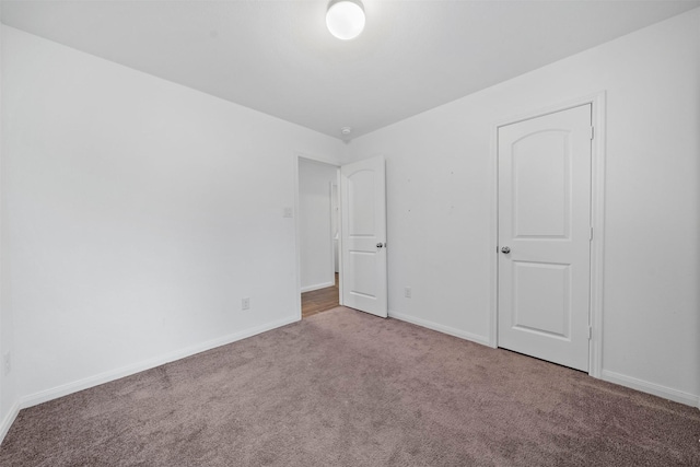 unfurnished bedroom featuring carpet floors