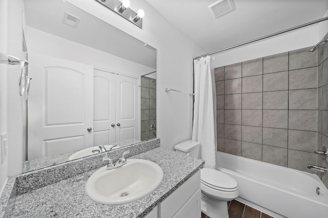 full bathroom with shower / tub combo with curtain, toilet, vanity, and wood-type flooring