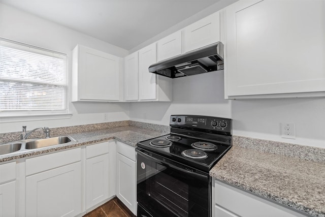 kitchen featuring white cabinetry, ventilation hood, sink, light stone counters, and black / electric stove