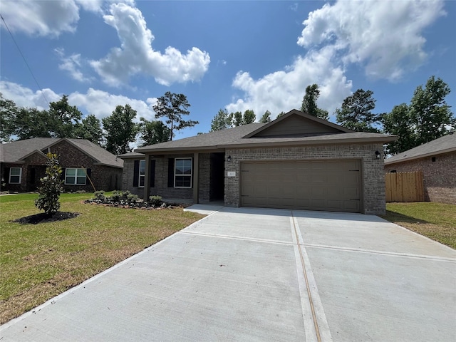 ranch-style house with a front lawn, driveway, fence, a garage, and brick siding
