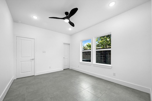 empty room featuring ceiling fan