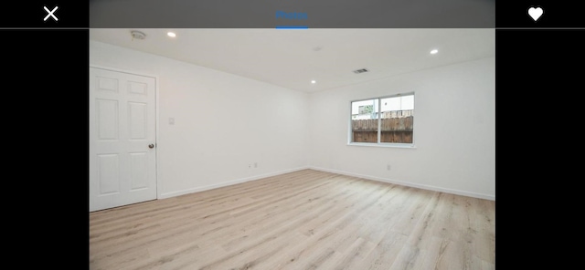 empty room featuring light wood-type flooring