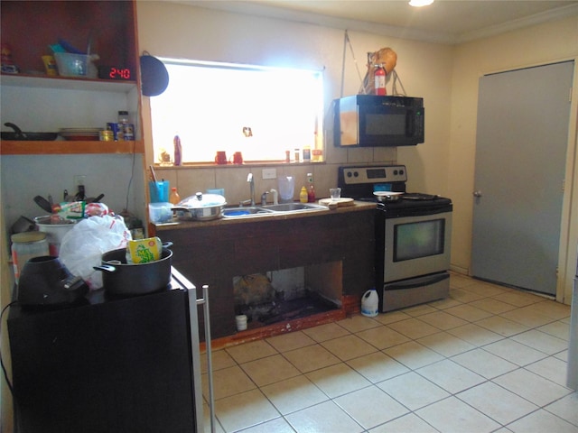 kitchen with stainless steel range with electric cooktop, decorative backsplash, crown molding, light tile patterned floors, and sink