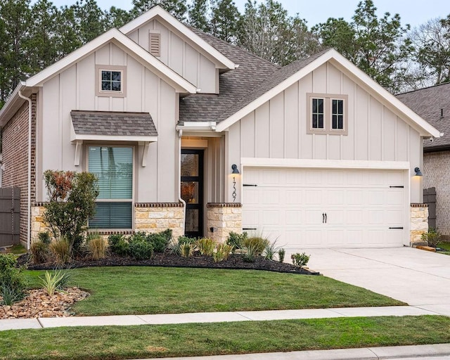 view of front of home with roof with shingles, board and batten siding, a garage, driveway, and a front lawn