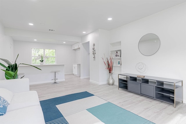 living room featuring light wood-type flooring