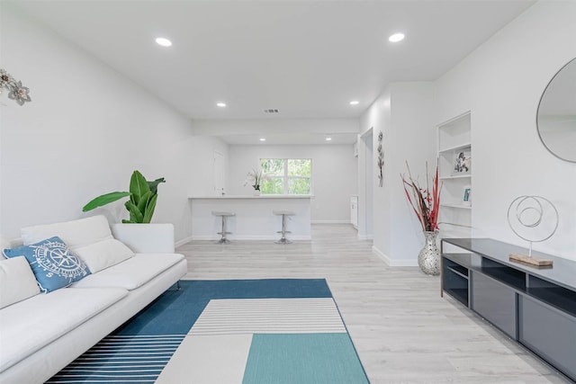 living room with light wood-type flooring