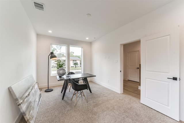 515 Egan St, Houston, TX 77020 - dining room with light colored carpet, baseboards, and recessed lighting
