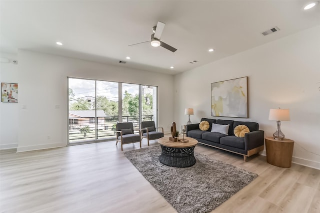 515 Egan St, Houston, TX 77020 - living area with light wood-type flooring, recessed lighting, baseboards, and ceiling fan