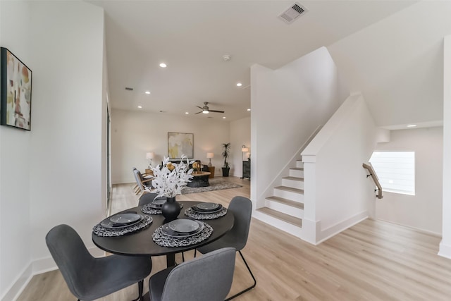 515 Egan St, Houston, TX 77020 - dining space with light wood-style floors, ceiling fan, recessed lighting, baseboards, and stairs
