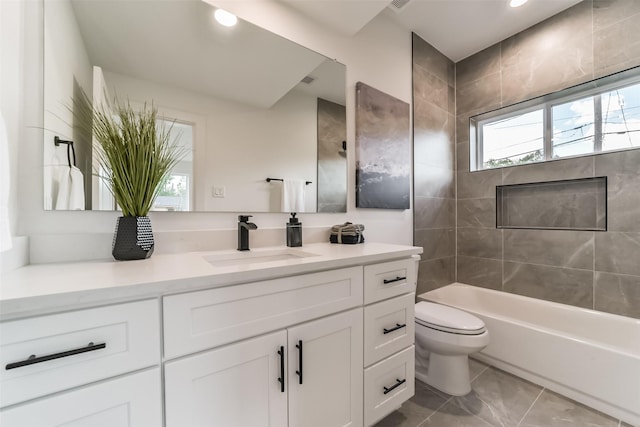 515 Egan St, Houston, TX 77020 - bathroom featuring plenty of natural light, vanity, toilet,  shower combination, and recessed lighting