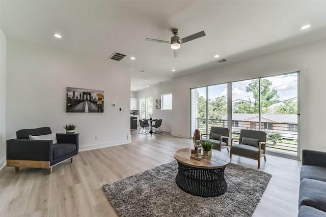 515 Egan St, Houston, TX 77020 - living area with light wood finished floors, ceiling fan, baseboards, and recessed lighting