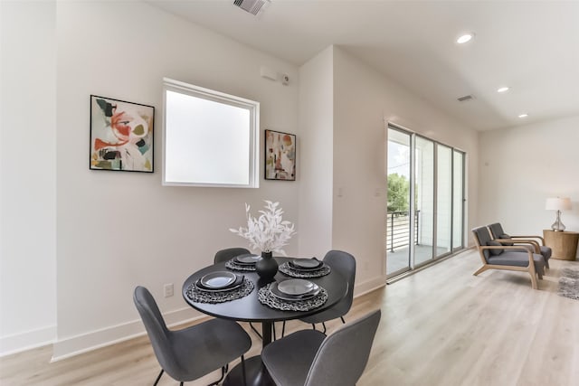 515 Egan St, Houston, TX 77020 - dining area with light wood-style floors, baseboards, and recessed lighting
