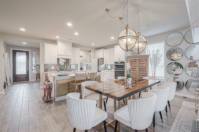 dining room with light hardwood / wood-style flooring