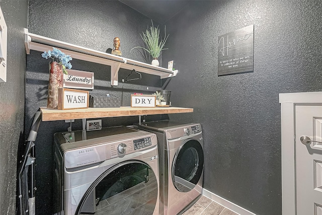 laundry room with washer and clothes dryer