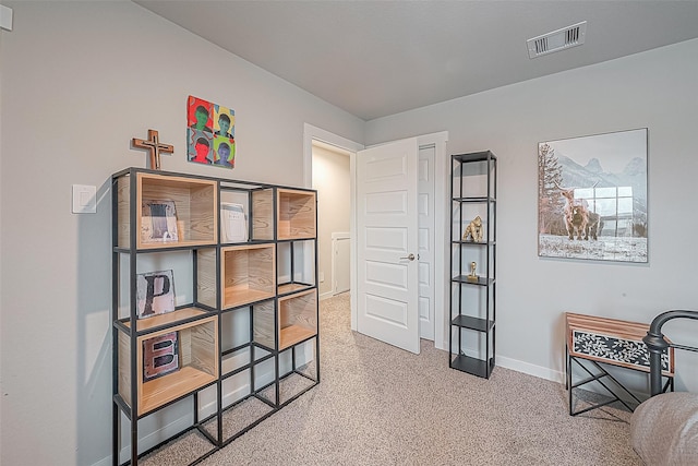 living area with carpet