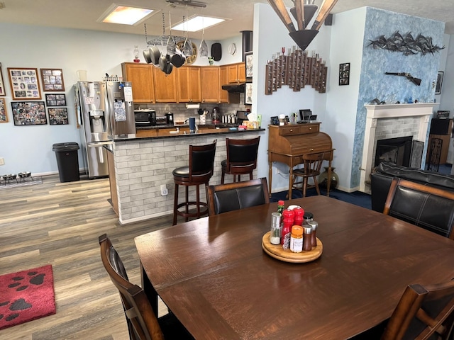 dining area featuring wood-type flooring