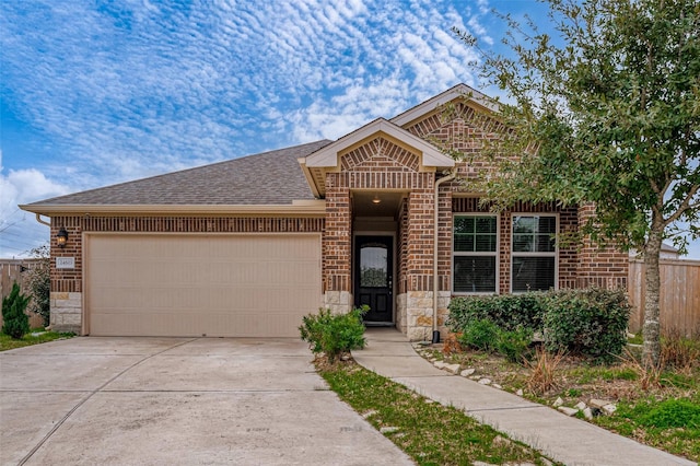 view of front of home with a garage