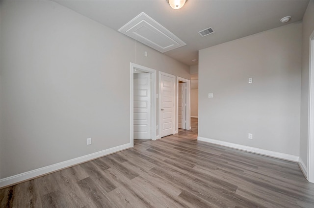 unfurnished room featuring light wood-type flooring