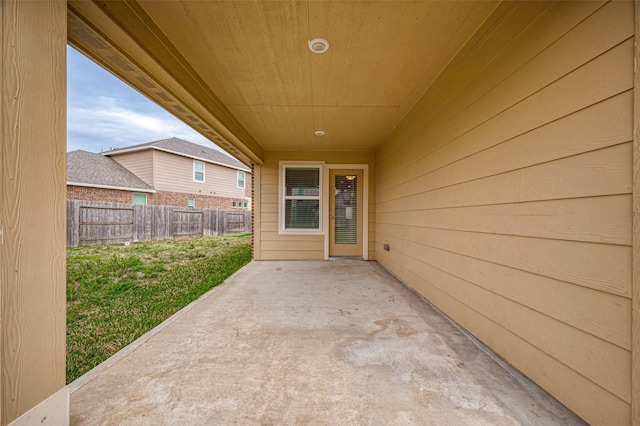 doorway to property featuring a patio area