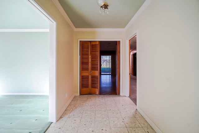 hallway featuring ornamental molding