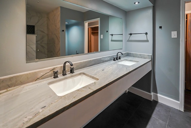 bathroom featuring tile patterned floors and vanity