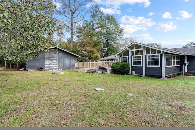 view of yard with a deck