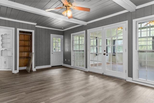 interior space with french doors, ornamental molding, hardwood / wood-style flooring, and ceiling fan