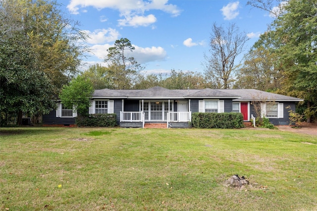 ranch-style home with a porch and a front yard