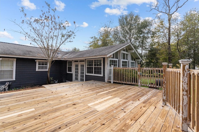 wooden deck featuring french doors