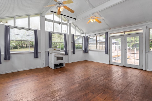 unfurnished sunroom featuring ceiling fan, french doors, and lofted ceiling with beams