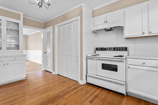 kitchen featuring light hardwood / wood-style floors, white cabinetry, white electric stove, and ornamental molding