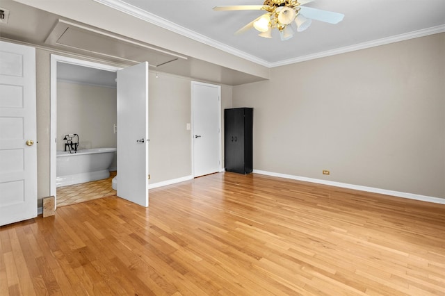 interior space with light hardwood / wood-style flooring, ceiling fan, and ornamental molding