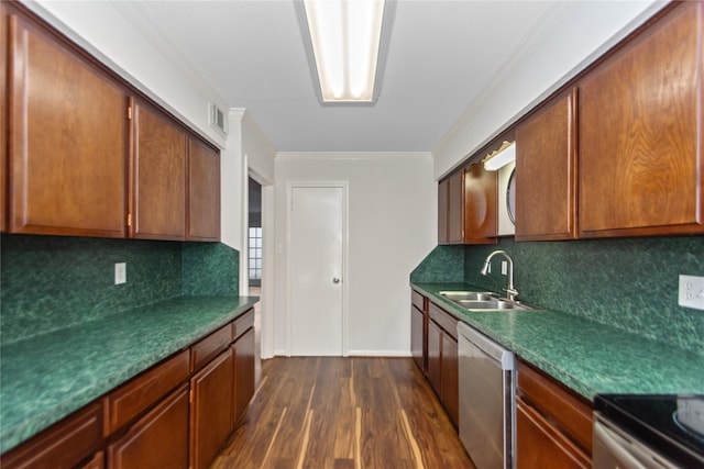 kitchen with dishwasher, crown molding, backsplash, sink, and dark hardwood / wood-style floors